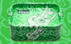 A green rectangular Airtight Stash Box & Tray features a white hand-drawn design of a hand with an eye in the palm, surrounded by abstract patterns. The word “CAMO” is printed on the inner side.