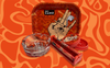 Camo Rolling Kit with tray, grinder, rolling machine, and glass ashtray featuring red-orange psychedelic art of a hand with an eye on wavy background.